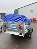 Прицеп Кремень стандарт плюс 2,5*1,3 с бортом 50 см с тентом 30 см