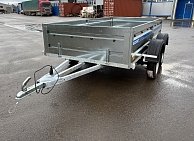 Прицеп Кремень стандарт плюс двухосный 3,0*1,56А см с бортом 31 с тентом 120 см