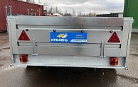 Прицеп Кремень стандарт плюс двухосный 3,0*1,56А см с бортом 31 с тентом 120 см