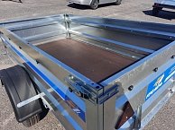 Прицеп Кремень стандарт плюс 2,5*1,3 с бортом 50 см с тентом 30 см