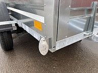 Прицеп Кремень стандарт плюс двухосный 3,0*1,56А см с бортом 50 с тентом 100 см