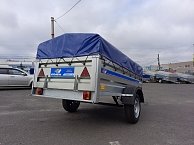 Прицеп Кремень стандарт плюс 2,5*1,56 с бортом 50 см с тентом 30 см